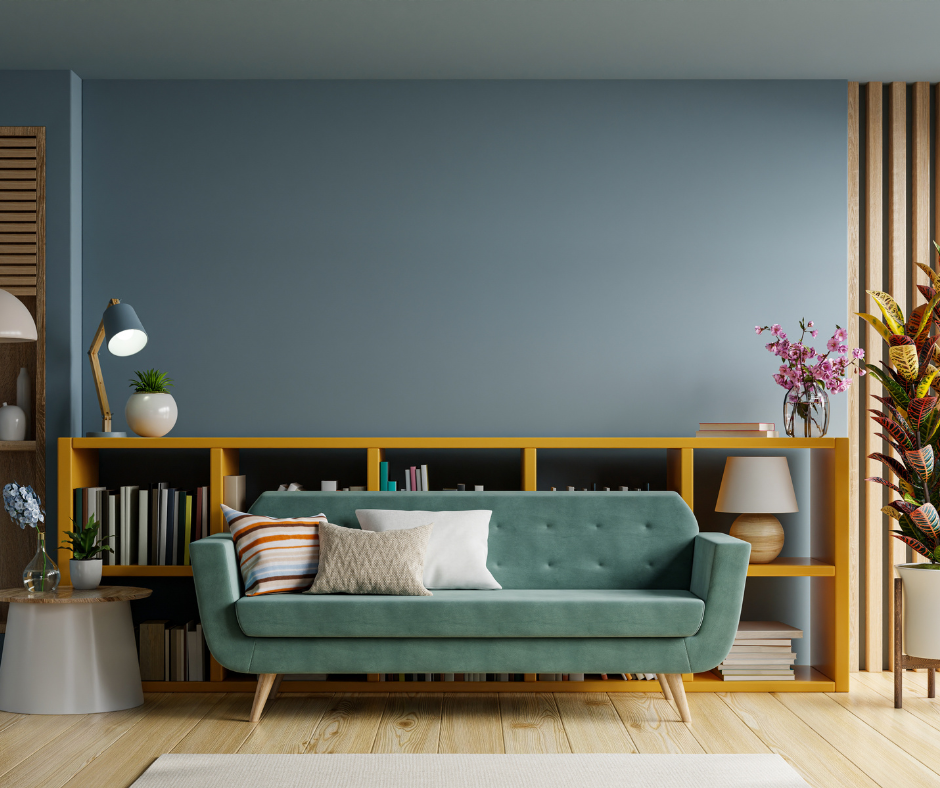 Green velvet sofa in blue living room